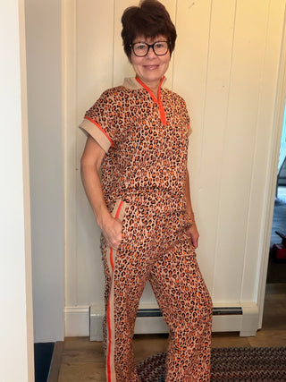 Lee Animal Print Set-SetsLeopard Print Quarter-Zip Set | VerClare Boutique-Shop the Lee leopard print set with a quarter-zip top and elastic-waist pants with side pockets. Cotton blend available in sizes S, M, and L.-VerClare Boutique