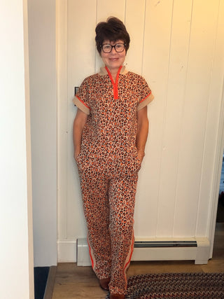 Lee Animal Print Set-SetsLeopard Print Quarter-Zip Set | VerClare Boutique-Shop the Lee leopard print set with a quarter-zip top and elastic-waist pants with side pockets. Cotton blend available in sizes S, M, and L.-VerClare Boutique