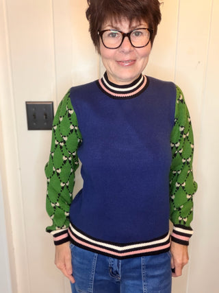 Frankie Pattern Sleeve Contrast Knit Sweater-SweatersNavy & Green Pattern Sleeve Knit Sweater | VerClare-Shop the Frankie navy and green knit sweater with patterned contrast sleeves and a soft viscose blend. Designed in the USA; sizes XS, S, M, and L.-VerClare Boutique