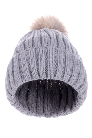 Light grey knit beanie with a pom-pom on a white background