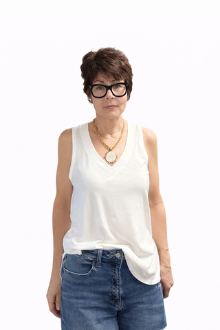 The California Tank - White-Tops Basic SolidThe California Tank - White | VerClare Boutique | Jenison MI -The California Tank is a beautiful soft cotton knit sleeveless tank featuring a classic crew neckline, a relaxed silhouette, and an effortlessly versatile design. Free US shipping on eligible orders. -VerClare Boutique