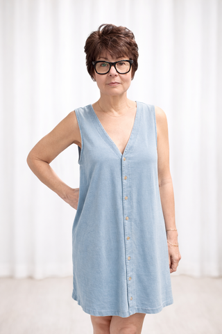 Solace Denim Mini Dress - Ocean Air Indigo-Dresses & RompersSolace Denim Mini Dress - Ocean Air Indigo | VerClare Boutique | Jenison MI -The Z Supply Solace Denim Mini Dress is a beautiful cotton knit jersey sleeveless mini dress featuring a flattering V-neckline, a button-front design, and an easy, everyday silhouette. Free US shipping on eligible orders. -VerClare Boutique